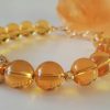 Bratara prosperitatii din citrin 10mm si accesorii placate aur