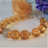 Bratara prosperitatii din citrin 10mm si accesorii placate aur